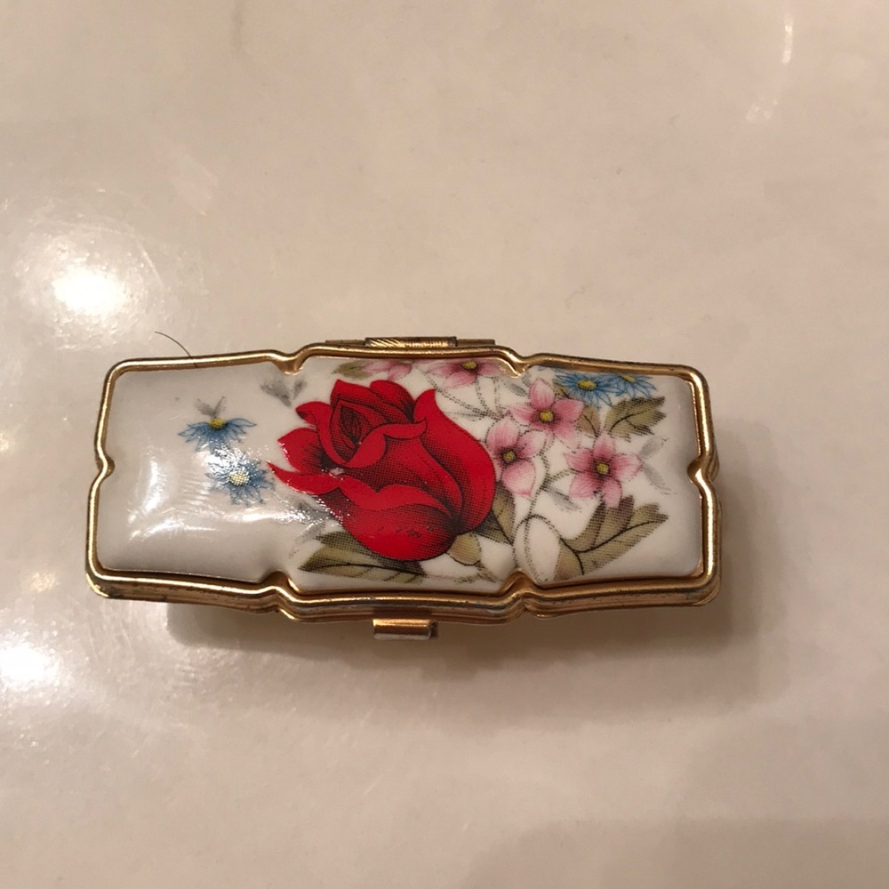 Gold lipstick holder and mirror